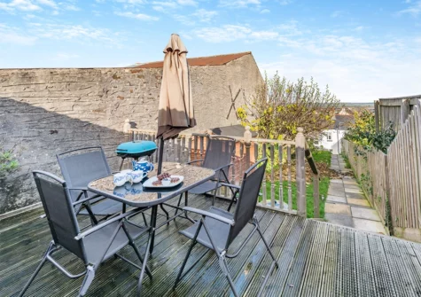 The decked patio & alfresco dining area at Fig Tree Cottage, Appledore