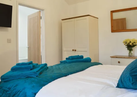 The bedroom at Fig Tree Cottage, Pancrasweek