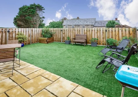 The patio, outdoor sitting area & enclosed gaden at Fig Tree Cottage, Pancrasweek