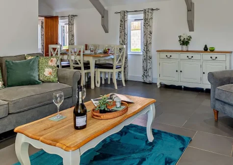 Firebeacon, Firebeacon Farm, Edistone is a charming barn conversion on a working farm offering authentic rustic character, family-friendly amenities, outdoor adventures, and the perfect base for exploring the Devon and Cornwall border.