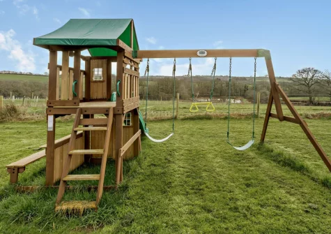 The shared children's play area at Fisherman's Rest at Blagdon Farm, Ashwater