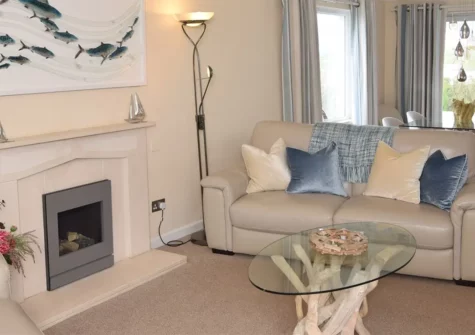 Fistral Rise, Newquay is a luxurious 2-bedroom apartment with stunning sea views, a private patio, and easy access to Fistral Beach as well as being steps away from the scenic cliff-top walks and close to the town's amenities and nearby attractions.