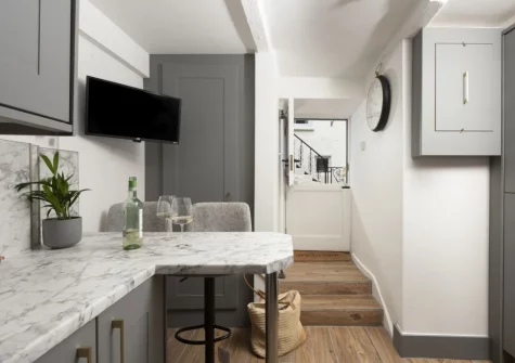 The kitchen & breakfast bar at Fond Memories Cottage, St Ives