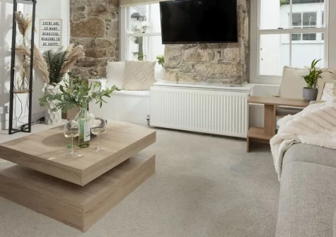 Fond Memories Cottage, St Ives is a charming four-storey retreat in historic Digey quarter. Enjoy original stone features, cosy window seats, sea glimpses from the top floor, and steps from independent galleries, scenic harbour, and stunning beaches.