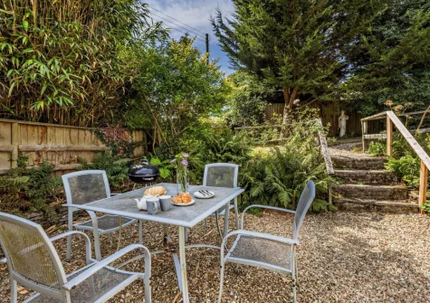 The patio, barbecue, alfresco dining area & garden at Ford Mill Dairy, Ashmansworthy