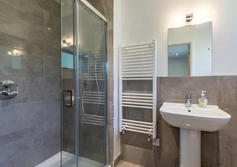 Bedroom #1 en-suite shower room at Forda Lodge, Forda