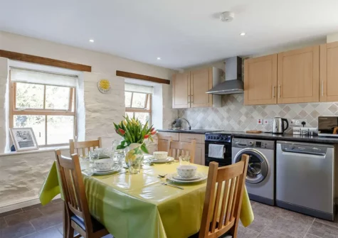 The kitchen & dining area at Forge Manor Cottage, Cambrose
