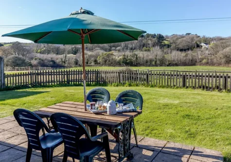The patio, alfresco dining area & garden at Forge Manor Cottage, Cambrose