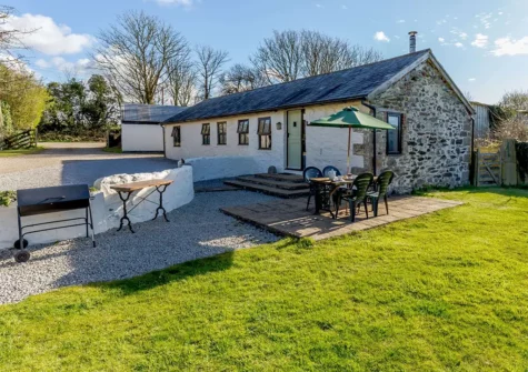 The patio, alfresco dining area & garden at Forge Manor Cottage, Cambrose