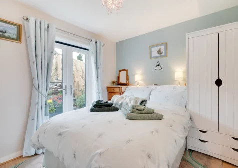 The bedroom at Forget-me-not Bungalow, Seaton