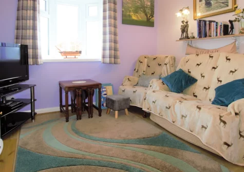 Forget-me-not Bungalow, Seaton, is a charming coastal retreat brimming with quirky character. Enjoy a beautiful garden with summerhouse, peaceful valley views, and easy access to the spectacular Jurassic Coast. Ideal for a romantic couples' escape.
