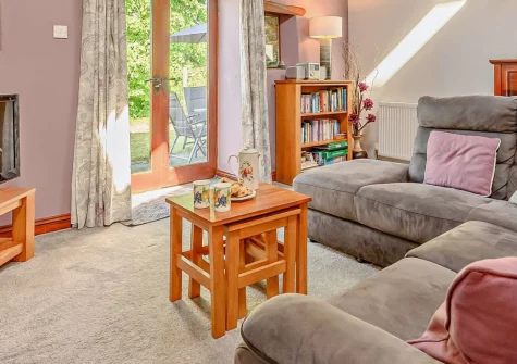 Four Seasons, Crumplehorn is a beautifully converted barn in peaceful countryside near Polperro, featuring exposed beams, vaulted ceilings, private gardens, shared play facilities, and farmland to explore with friendly animals to meet.