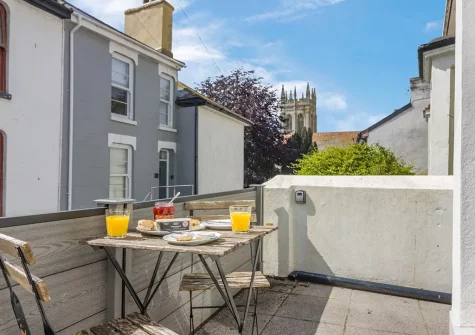 The front patio & outdoor sitting area at Fourteen Captains Cottage, Brixham