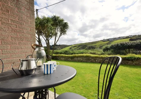 The patio & outdoor sitting area at Fourteen Mawgan Porth, Mawgan Porth