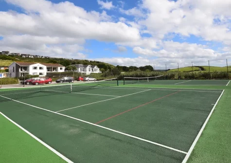 The shared tennis courts at Fourteen Mawgan Porth, Mawgan Porth