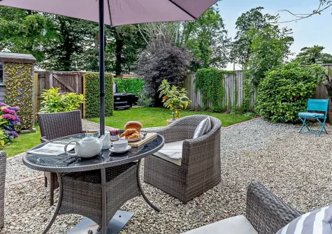 The patio & alfresco dining area at Foxes At Langoose, Lanhydrock