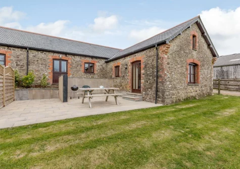 The patio, alfresco dining area & garden at Foxglove Barn, Greylands Farm, Youldonmoor Cross