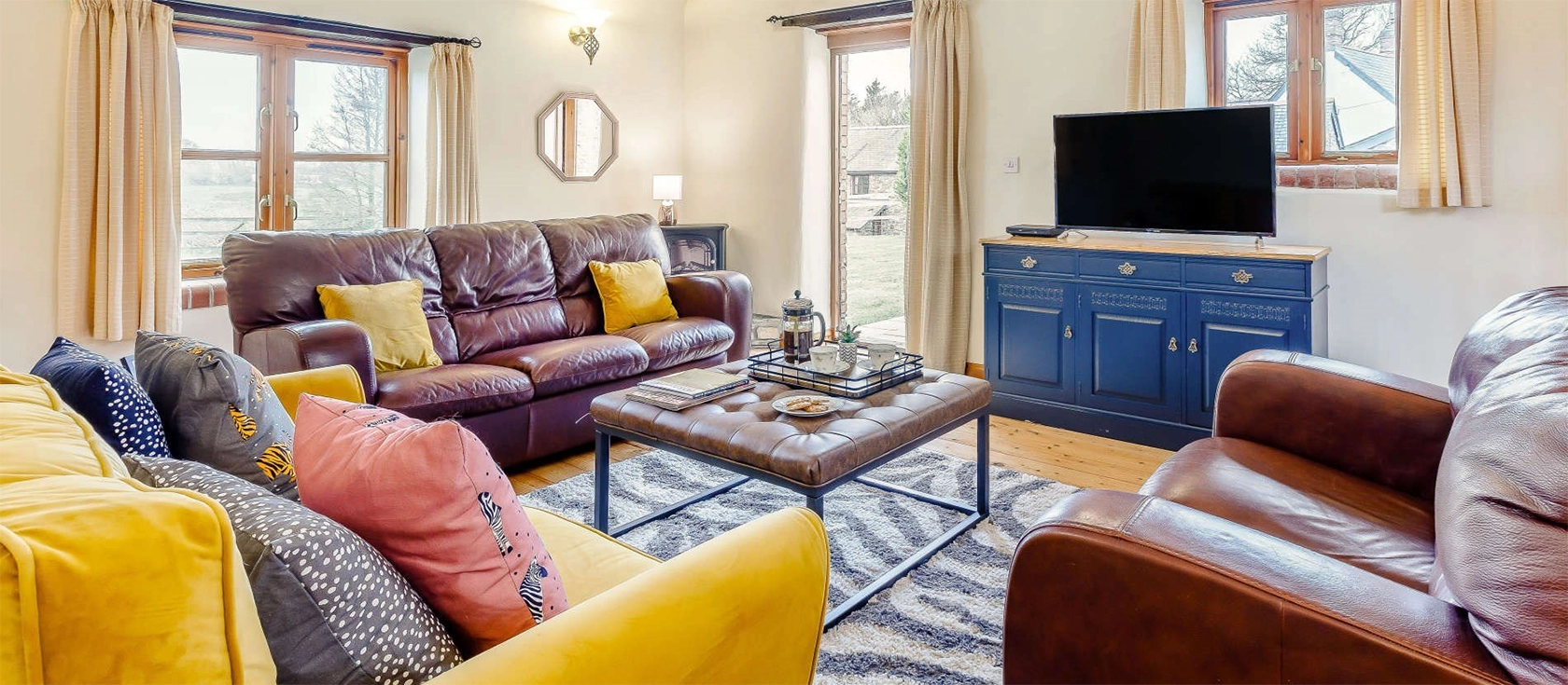 Foxglove Barn, Greylands Farm, Youldonmoor Cross is a cosy 2-bedroom barn conversion on a working farm, close to the beach and countryside. Offering stunning views, it's an ideal retreat for families seeking tranquillity and adventure in rural Devon.