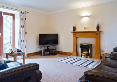 The living room at Foxgloves, Higher Trenower Farm, Newtown-in-St-Martin
