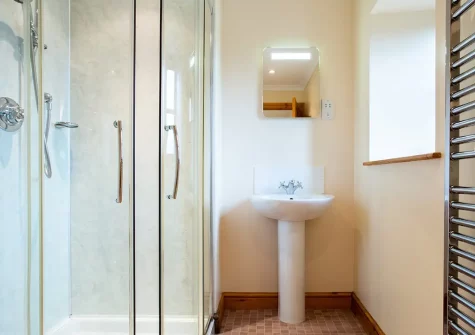 Bedroom #1 en-suite shower room at Foxgloves, Higher Trenower Farm, Newtown-in-St-Martin