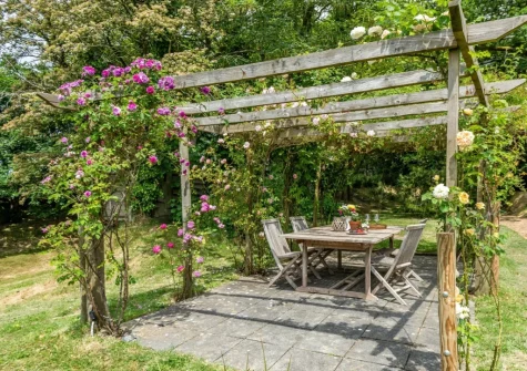 The pergola, alfresco dining area & garden at Fox's Folly, North Tamerton