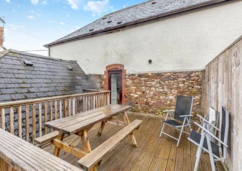 The decked patio & alfresco dining area at Freedom at Ashcombe Cottages, Ashcombe