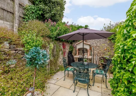 The patio & alfresco dining area at Frogwell Cottage, Brixham