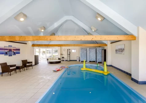 The shared indoor heated swimming pool at Gallantry Bower, Higher Clovelly