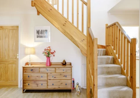 The hallway & stairs up to the first floor at Garden House, Bude