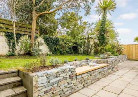 The patio & enclosed garden at Garden House, Bude