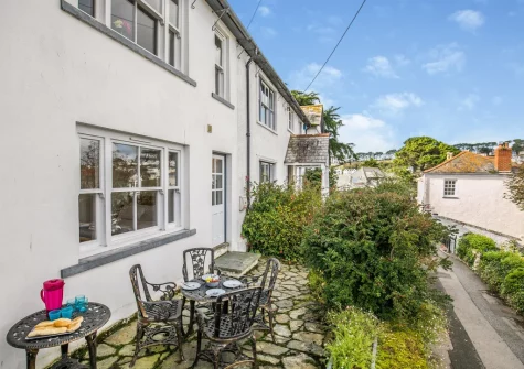The patio & alfresco dining area at Gartree Cottage, Polruan