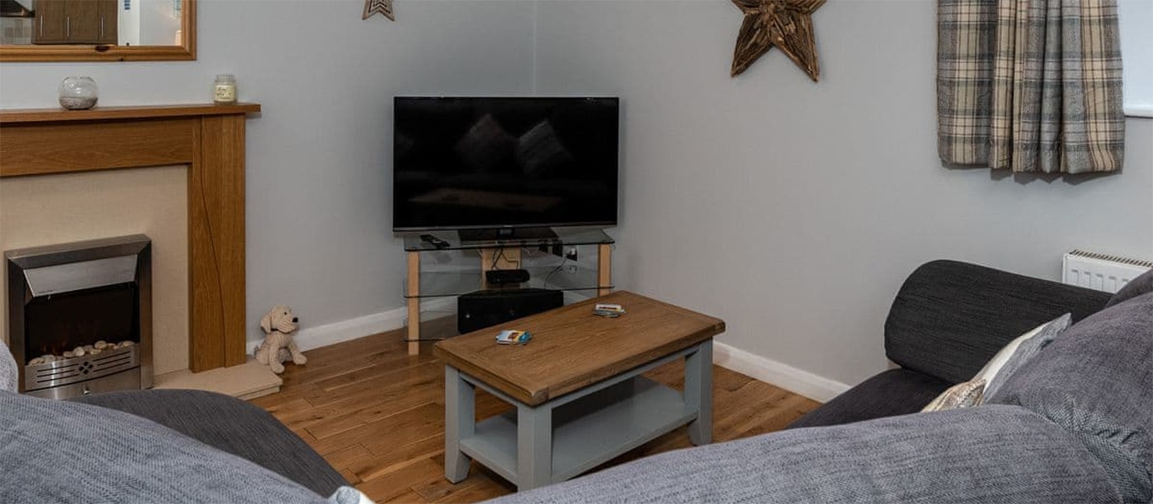Gemstone Cottage, Brixham is a two bedroom stone cottage with mezzanine snug to sleep five. Open plan living includes a gourmet kitchen with island & two sitting areas with TV/X-box360. Park in the dedicated space & walk to harbour, restaurants & beaches.