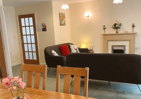 Gifford Close Bungalow, Hartland is a spacious single-storey retreat in the heart of this traditional North Devon village, featuring a sunny conservatory, enclosed garden, entertaining games room, and easy access to dramatic Atlantic coastal walks.