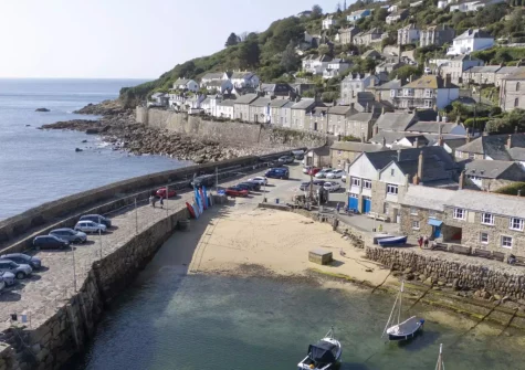 Mousehole Harbour's pretty low-tide beach is an idyllic place to soak up the sunshine & atmosphere