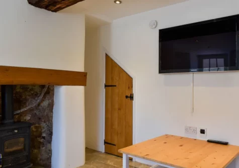The living area at Glimsters Cottage, Kentisbere