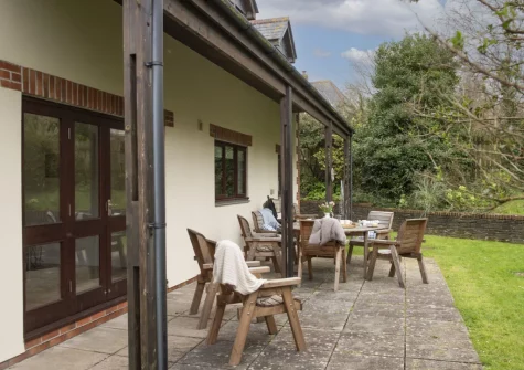 The patio, barbecue, alfresco dining area & garden at Godolphin at Roserrow, Polzeath