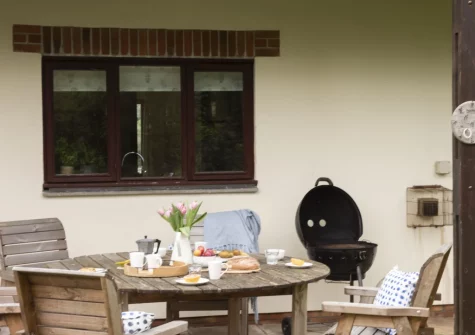 The patio, barbecue & alfresco dining area at Godolphin at Roserrow, Polzeath