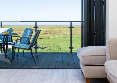 Golf View, Westward Ho! is a stylish and spacious 4-bedroom holiday cottage with a private hot tub, offering stunning sea views and within walking distance to local attractions, making it an ideal base for families to explore North Devon's treasures.