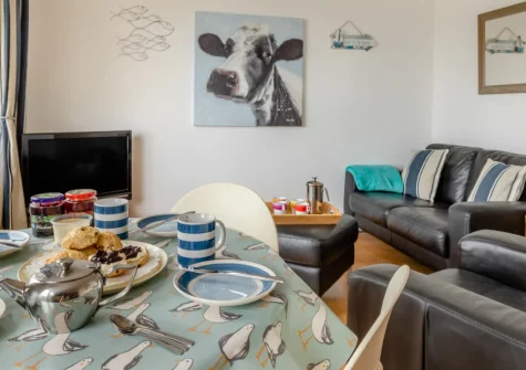 Gone To The Beach, Brixham is a bright, newly renovated bungalow on a family-friendly holiday park with Torbay sea views, indoor pool access, and Fishcombe Cove beach just metres down the hill, perfectly positioned for English Riviera adventures.