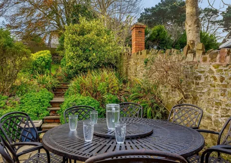 The patio, outdoor sitting area & garden at Goodamoor, Bideford