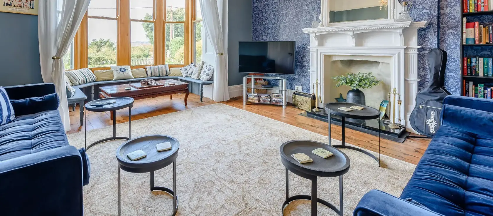 Goodamoor, Bideford is a magnificent seven-bedroom period property with stunning river views, private hot tub, and games room. Located metres from coastal paths and Tarka Trail, it's perfect for large family gatherings seeking luxury and adventure.