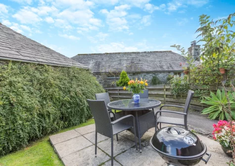The front patio, barbecue & alfresco dining area at Goosehill at Penrose Burden, St Breward