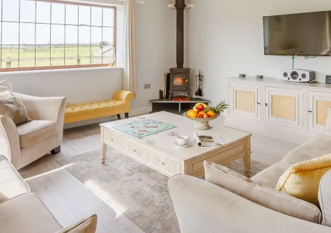 Gorgeous Cottage, Westward Ho! is a luxurious four-bedroom coastal retreat with stunning sea views, private hot tub, and shared facilities. Perfect for families seeking golden beaches, cliff-top walks, and unforgettable North Devon adventures.