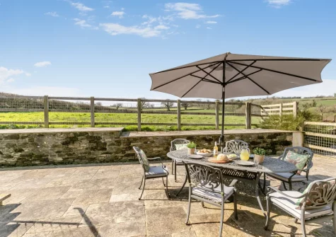 The enclosed patio, barbecue & alfresco dining area at Grampys Barn, Bray Shop
