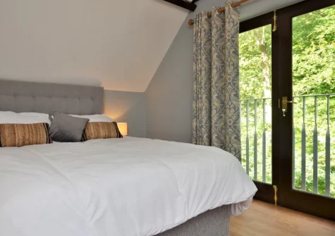 The bedroom at Granary Cottage at Heddon Valley Mill, Killington