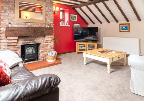 Granary Cottage, Swimbridge is a characterful 2-bedroom stone retreat featuring beamed ceilings, wooden floors, and a stream-side garden. Explore Exmoor's wild beauty, charming villages, and sandy beaches from this idyllic rural haven.