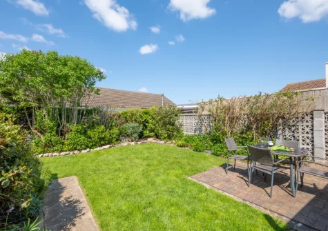 The patio, alfresco dining area & enclosed garden at Gull Cottage, St Merryn