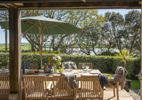 Step out on to the decked patio, barbecue & alfresco dining area