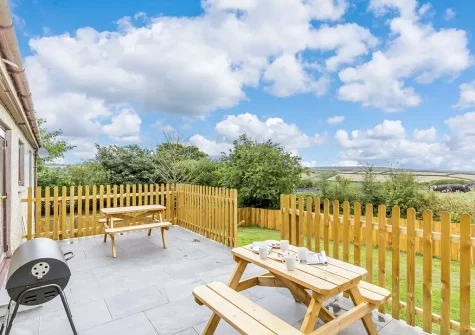 The patio, barbecue & alfresco dining area at Gwel Teg, Bodmin