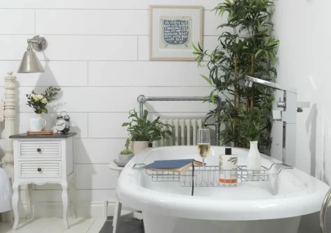 The bedroom, roll-top bath, at Gylly Cottage, Mousehole